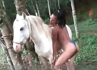 Slim zoophilic slut with a sexy horse