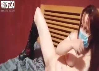 Zoo porn showing a sexy animal fucker on a bed