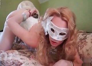 A hot bride is having all sorts of sexy fun with a dog