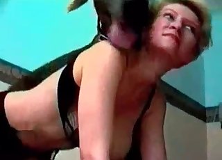 Doberman gives cunnilingus