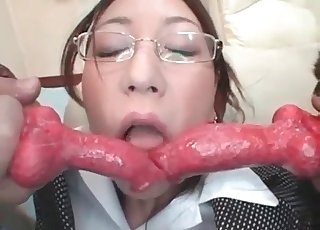 Two doggies nicely sucked by brunette